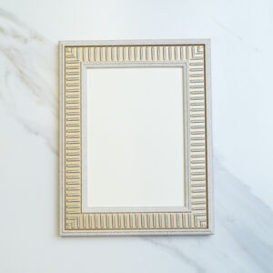 Elegant decorative mirror frame with gold accents and geometric design, perfect for modern home or office decor. Enhance your space with stylish, high-quality wall art.